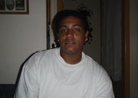 a man wearing a white shirt