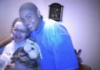 a woman holding a teddy bear