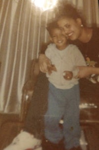 an old photo of a woman and a young boy